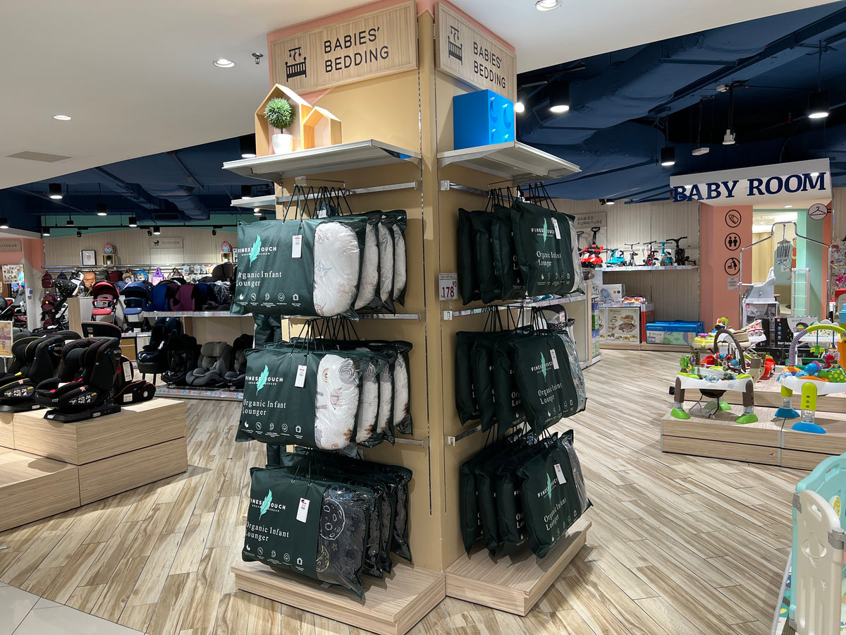 Finest Touch infant loungers displayed at a retail outlet